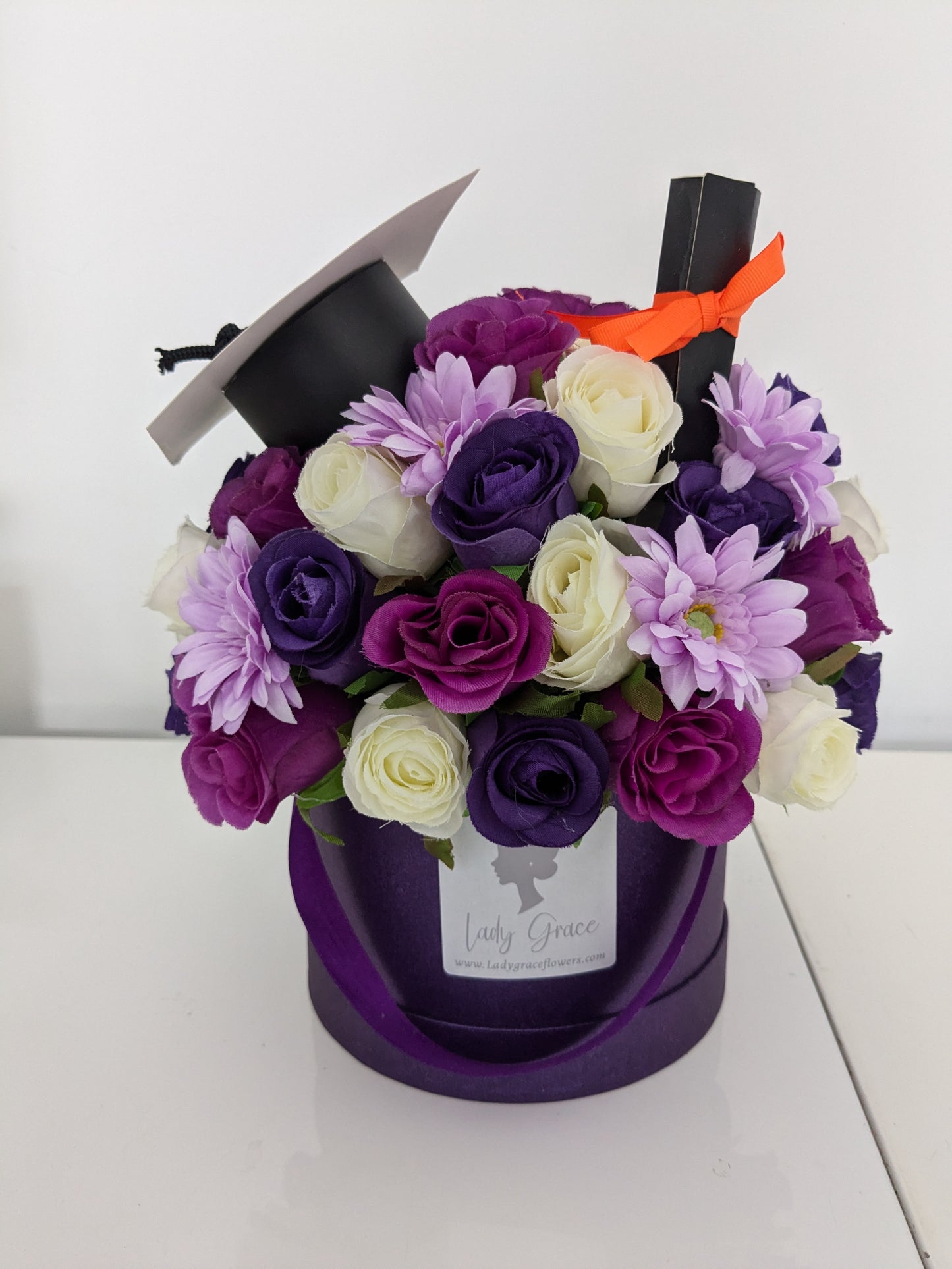 Graduation Purple Hat Box of Joy Silk Flowers Gift