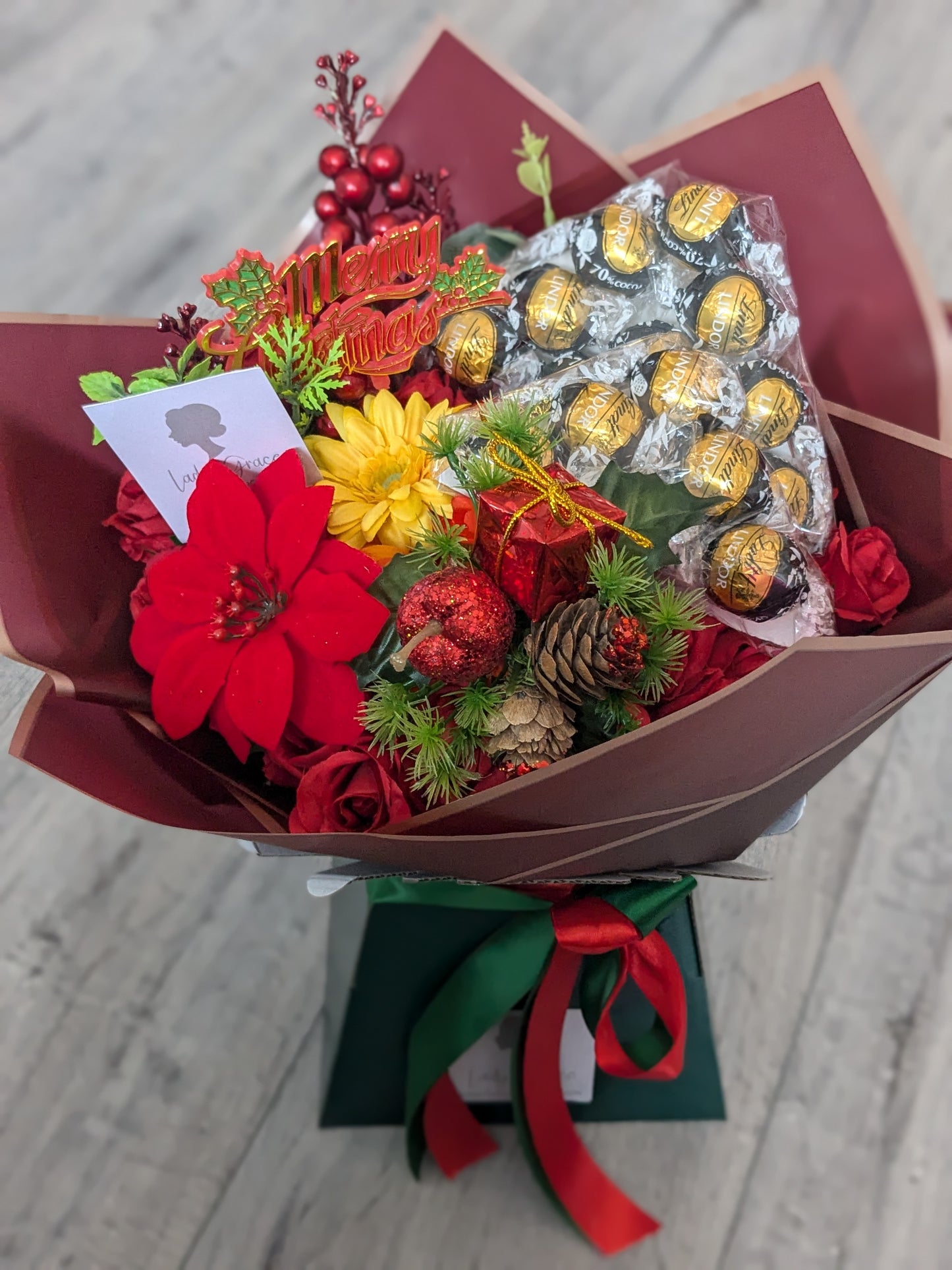 Christmas Red/Green Dark Lindt Stunning Handtied Bouquet