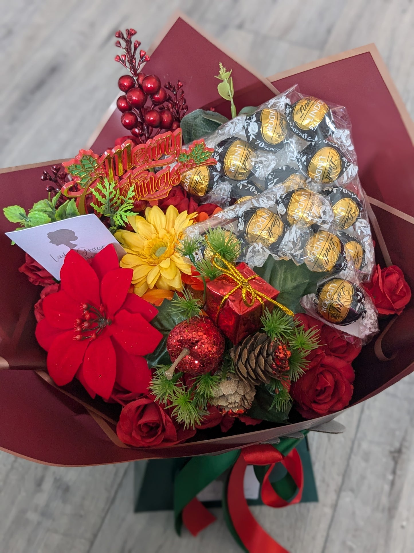 Christmas Red/Green Dark Lindt Stunning Handtied Bouquet