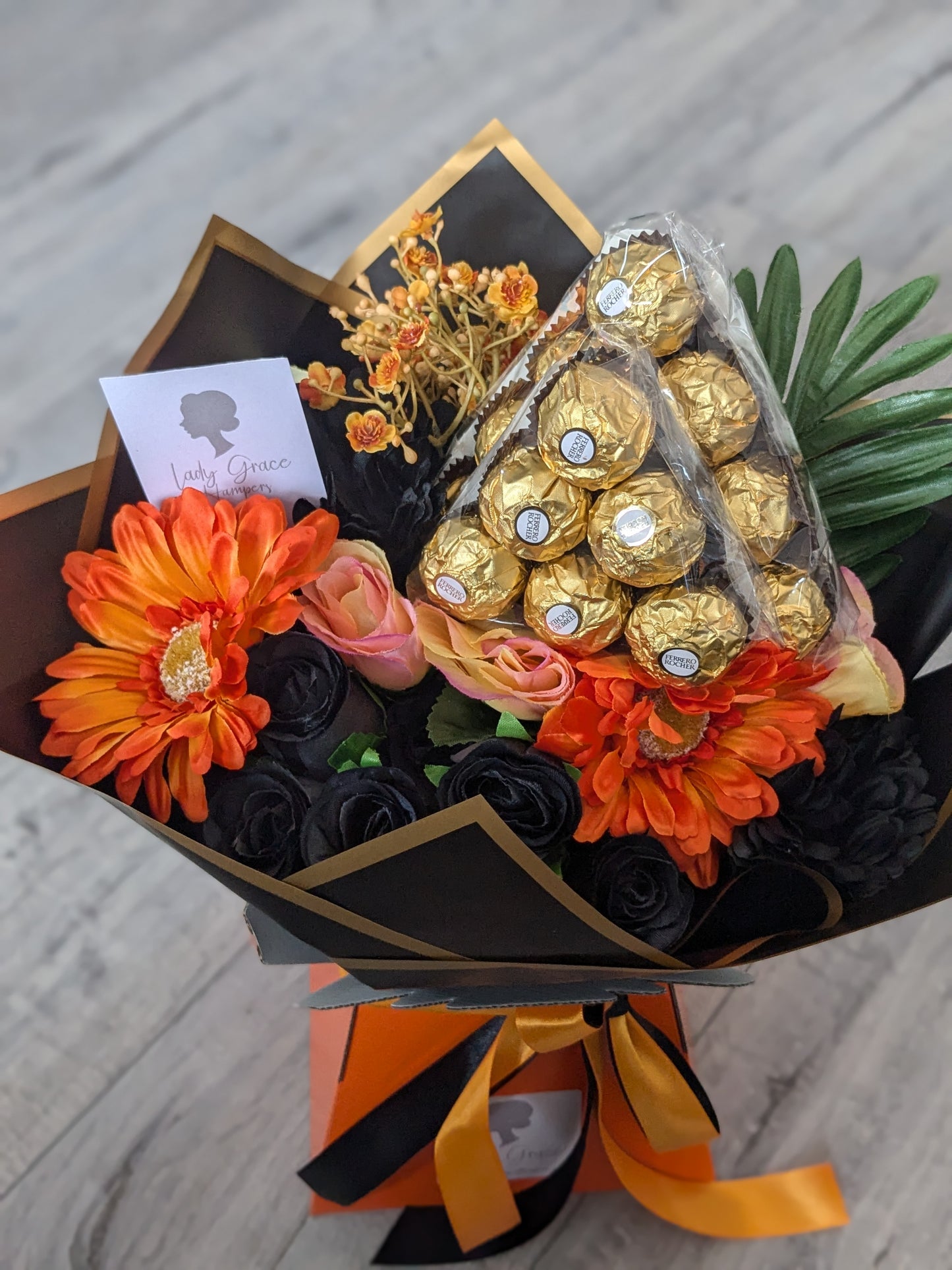 Orange & Black Ferrero Rocher Stunning Handtied Bouquet