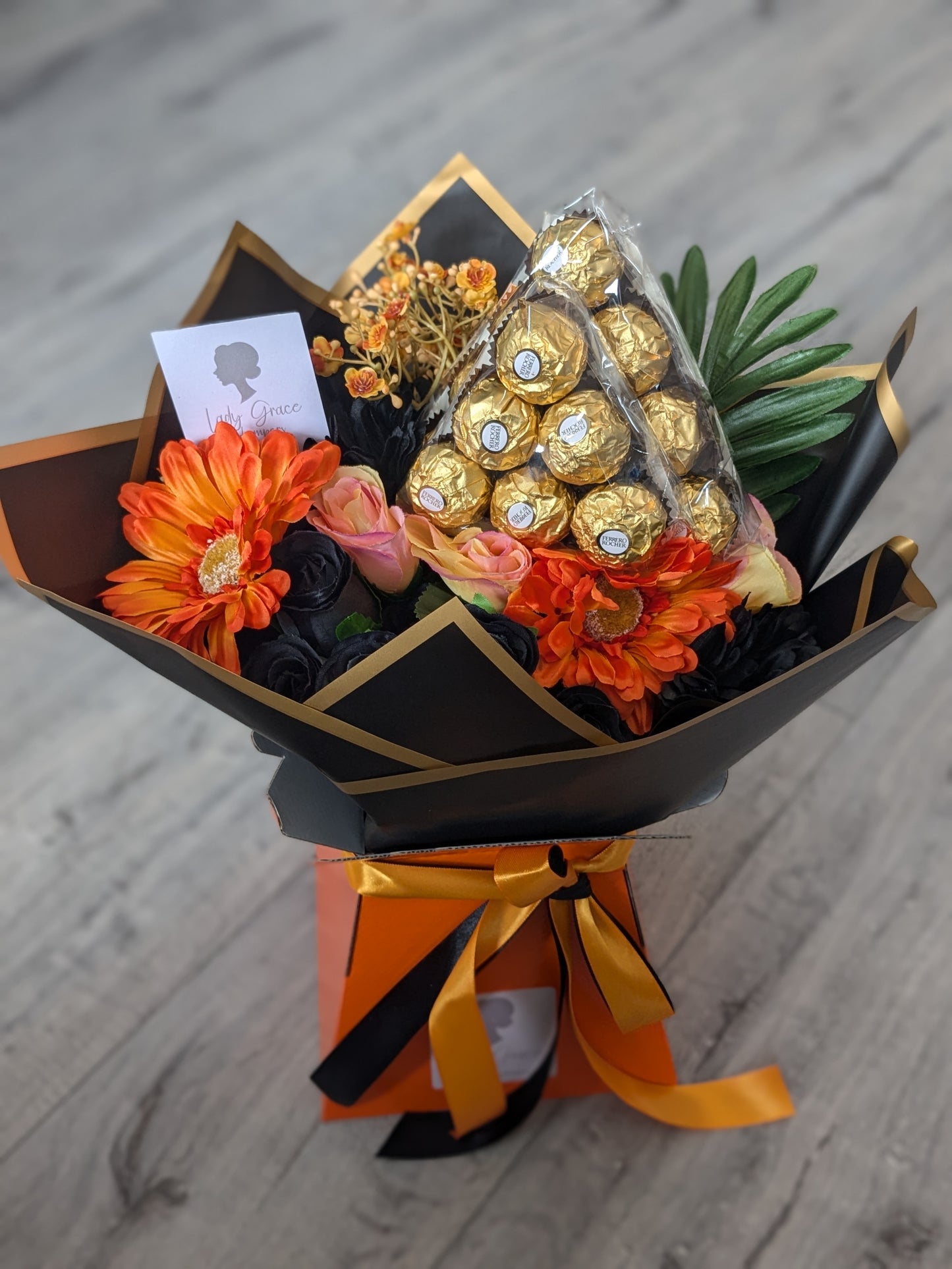 Orange & Black Ferrero Rocher Stunning Handtied Bouquet