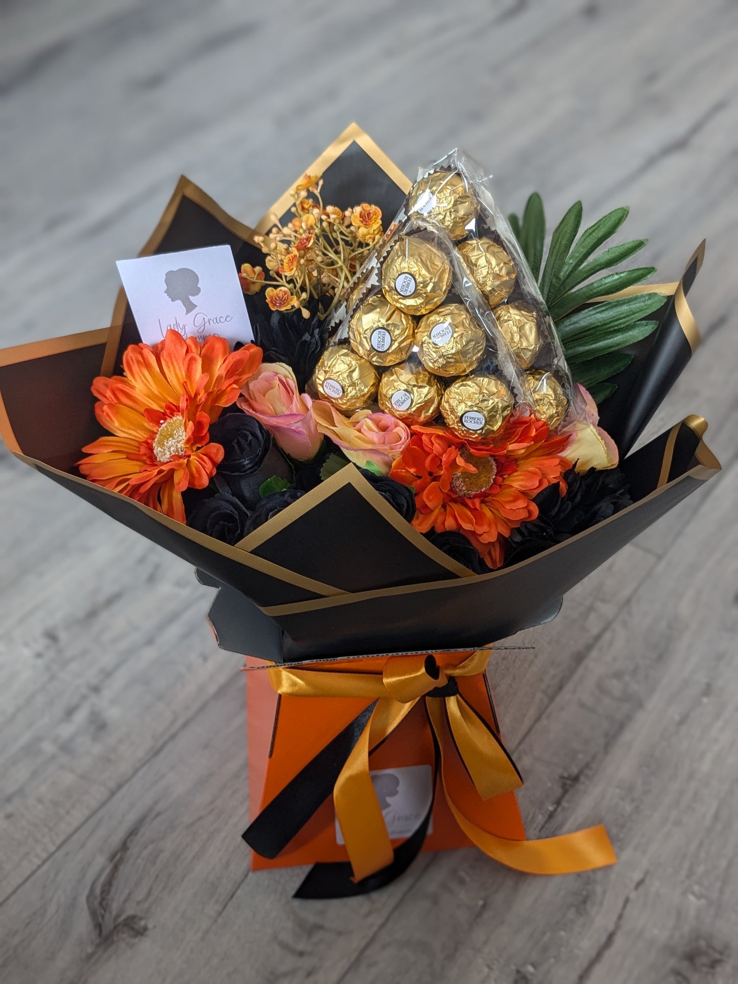 Orange & Black Ferrero Rocher Stunning Handtied Bouquet