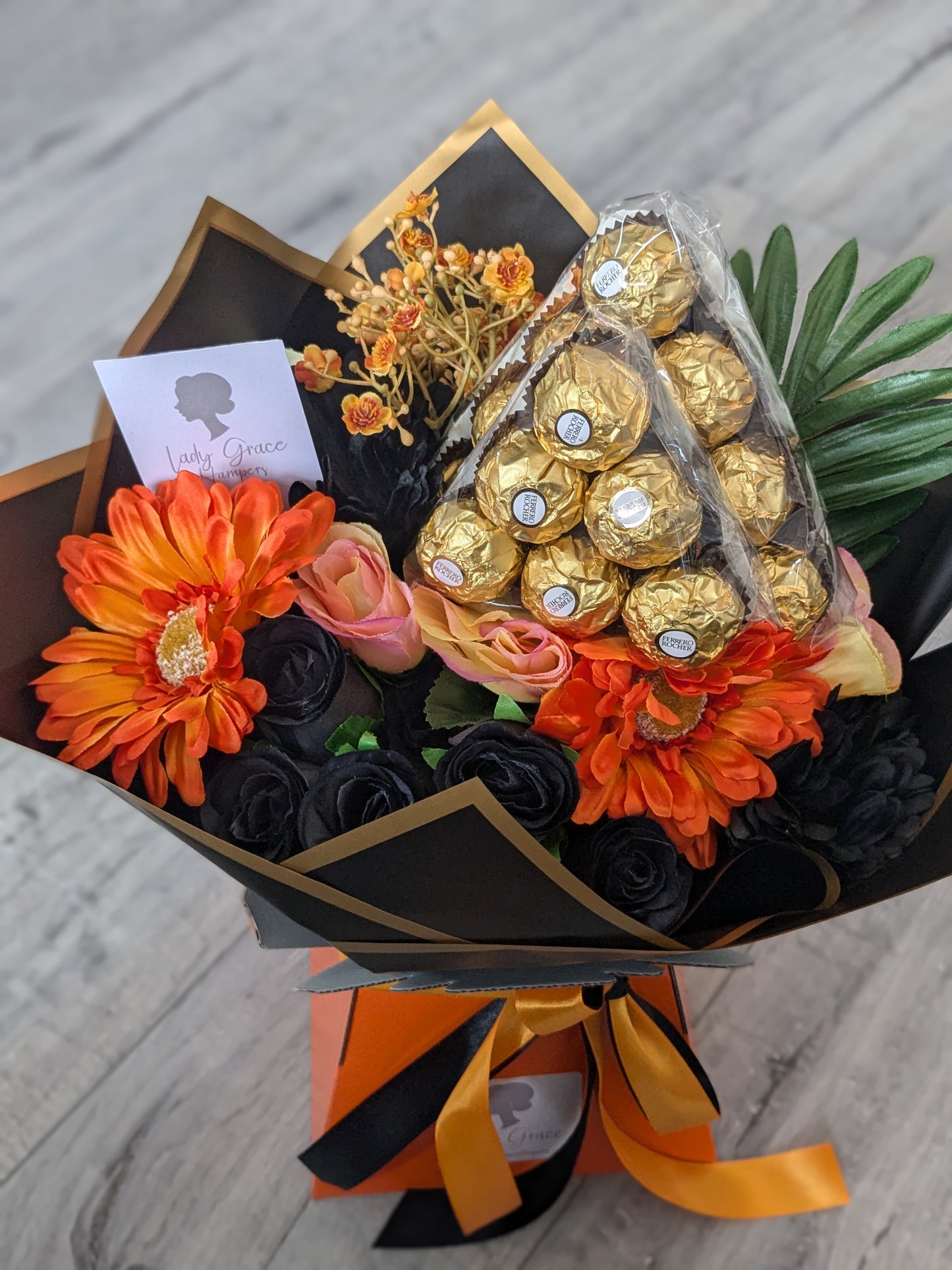 Orange & Black Ferrero Rocher Stunning Handtied Bouquet