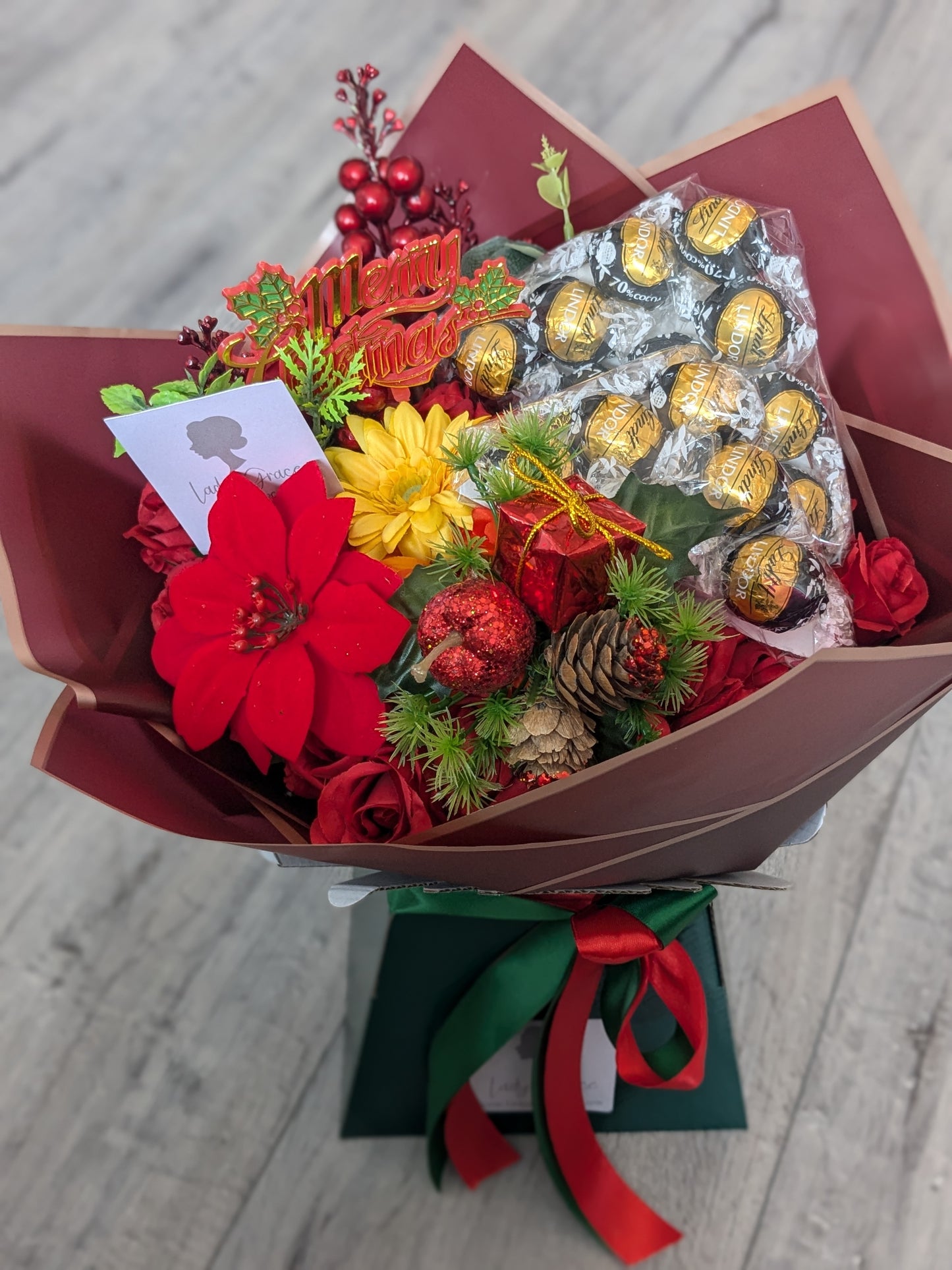 Christmas Red/Green Dark Lindt Stunning Handtied Bouquet