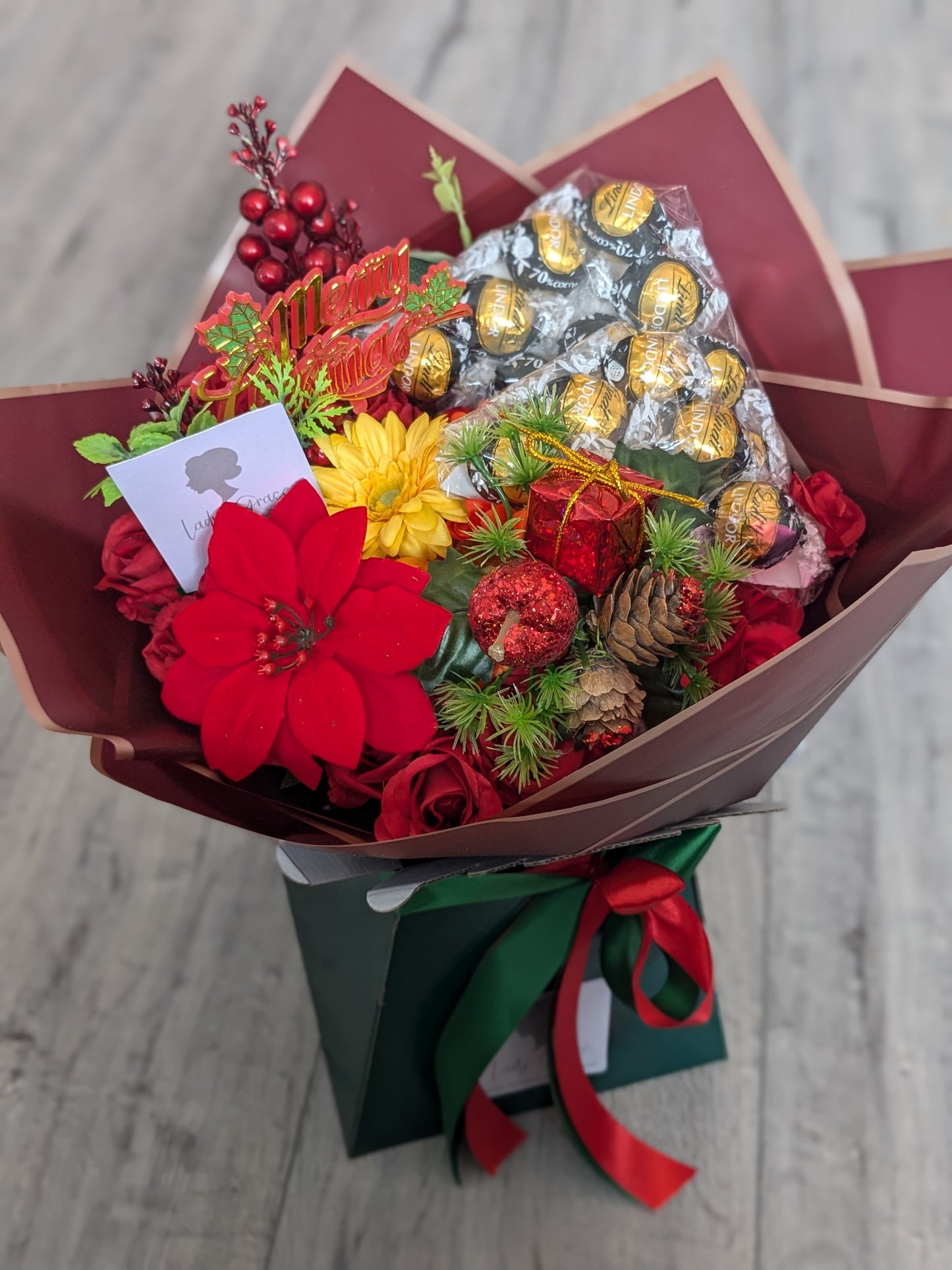 Christmas Red/Green Dark Lindt Stunning Handtied Bouquet