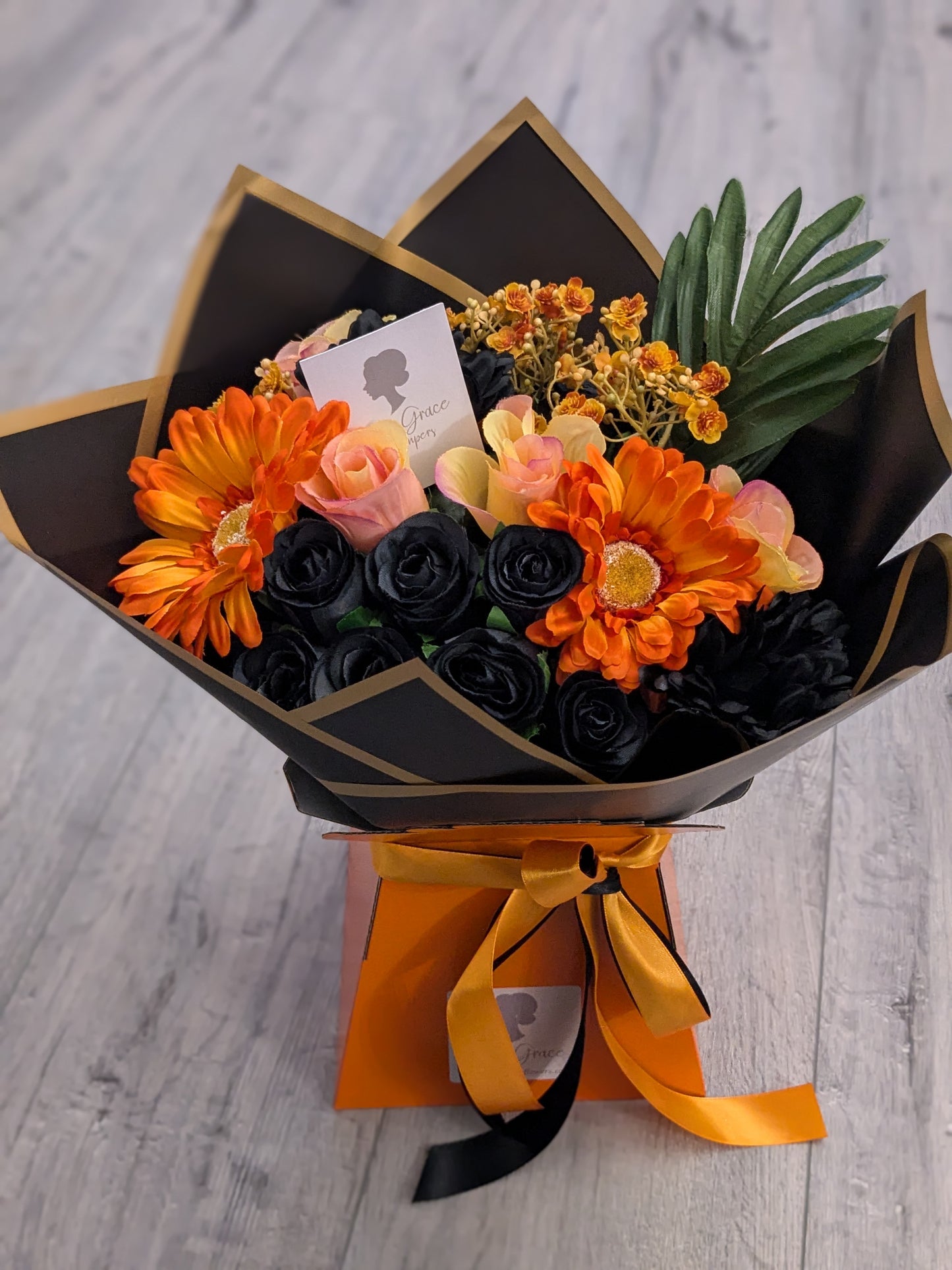 Orange & Black Stunning Handtied Bouquet