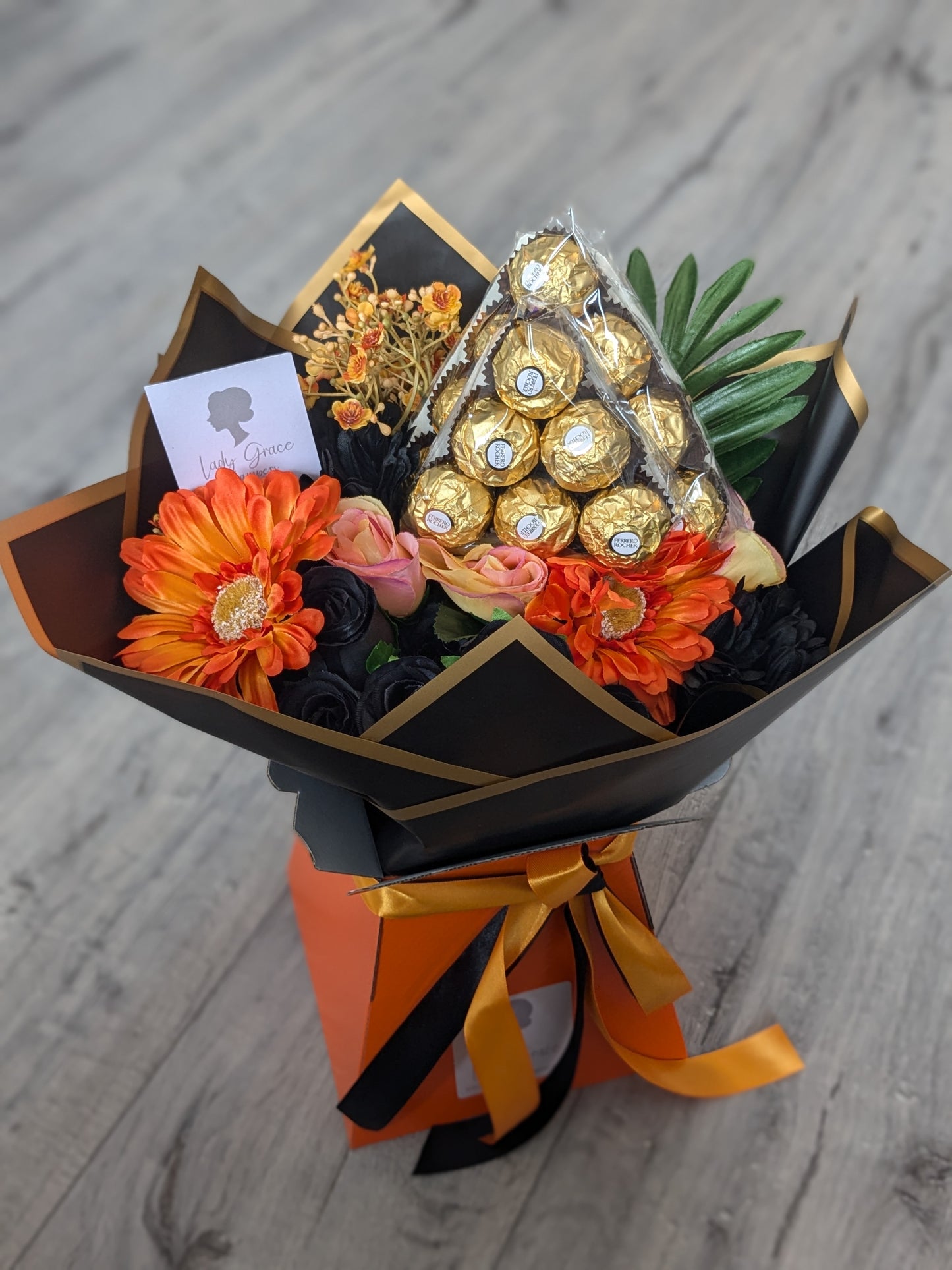 Orange & Black Ferrero Rocher Stunning Handtied Bouquet