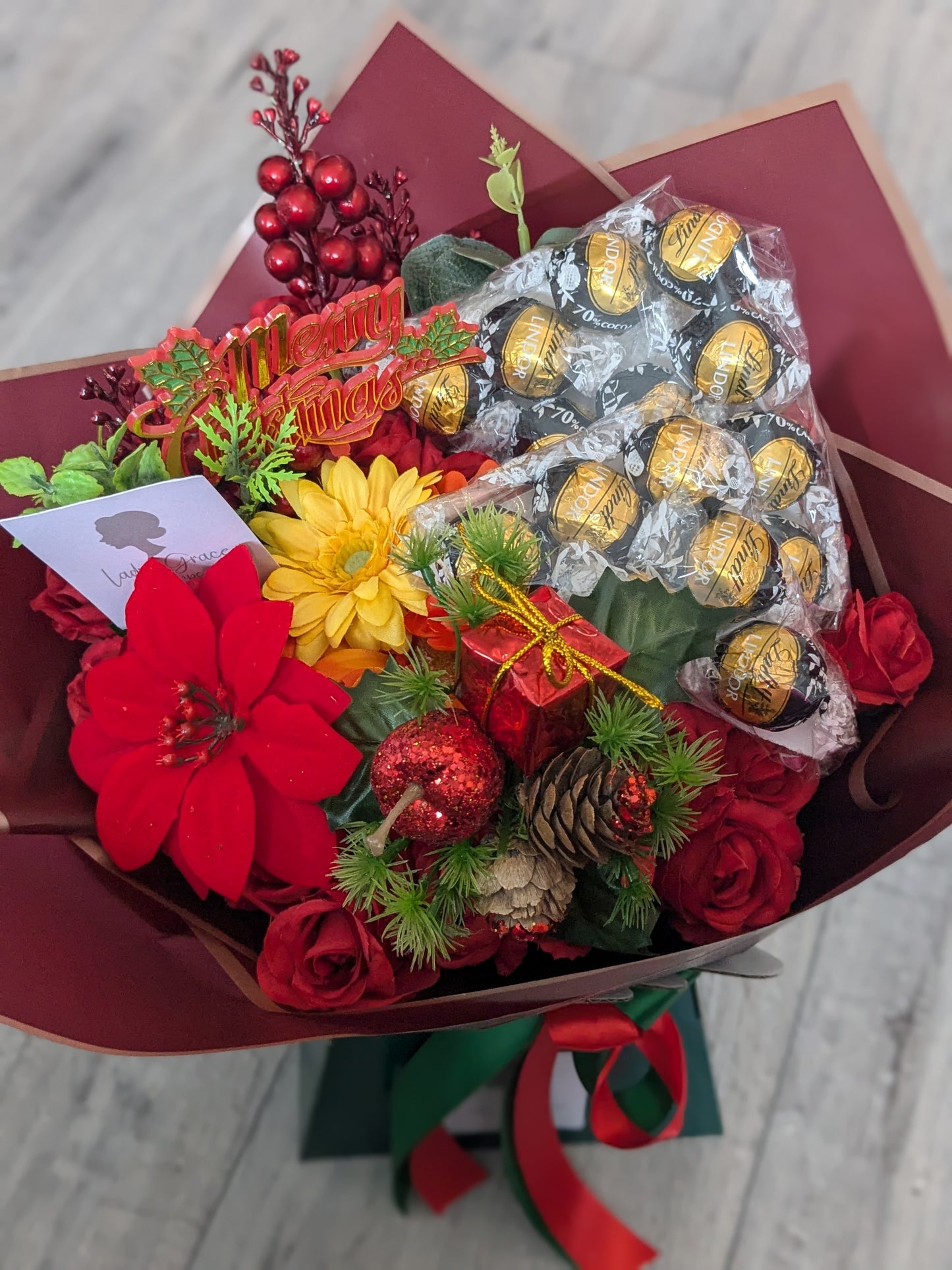 Christmas Red/Green Dark Lindt Stunning Handtied Bouquet